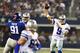 ARLINGTON, TX - SEPTEMBER 8: Tony Romo #9 of the Dallas Cowboys throws a pass during a game against the New York Giants at AT&T Stadium on September 8, 2013 in Arlington, Texas. (Photo by Wesley Hitt/Getty Images)
