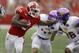 MADISON, WI - SEPTEMBER 07: Corey Clement #6 of the Wisconsin Badgers stiff arms Tevin McDermott #36 of the Tennessee Tech Golden Eagles while running upfield during the game at Camp Randall Stadium on September 07, 2013 in Madison, Wisconsin. (Photo by Mike McGinnis/Getty Images)