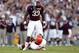 Nov 17, 2012; College Station, TX, USA; Texas A&M Aggies running back Christine Michael (33) taunts Sam Houston State Bearkats defensive back Kenneth Jenkins (32) during the first half at Kyle Field. Michael would be ejected on the play. Mandatory Credit: Thomas Campbell-USA TODAY Sports