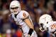 MANHATTAN, KS - DECEMBER 01: Quarterback Case McCoy #6 of the Texas Longhorns relays signals to D.J. Monroe #26 during the game against the Kansas State Wildcats at Bill Snyder Family Football Stadium on December 1, 2012 in Manhattan, Kansas. (Photo by Jamie Squire/Getty Images)