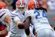 Sep 7, 2013; Miami Gardens, FL, USA; Florida Gators quarterback Jeff Driskel (6) hands off to running back Matt Jones (24) against the Miami Hurricanes during the second half of the game at Sun Life Stadium. Miami defeated Florida 21-16. Mandatory Credit: Brad Barr-USA TODAY Sports
