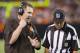 CLEVELAND, OH - AUGUST 15: Head coach Rob Chudzinski of the Cleveland Browns talks with Side Judge Joe Larrew during the second half against the Detroit Lions of a preseason at FirstEnergy Stadium on August 15, 2013 in Cleveland, Ohio. The Browns defeated the Lions 24-6. (Photo by Jason Miller/Getty Images)