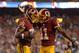 LANDOVER, MD - SEPTEMBER 09: Wide receiver Leonard Hankerson #85 of the Washington Redskins celebrates with teammate wide receiver Aldrick Robinson #11 after scoring a touchdown against the Philadelphia Eagles in the fourth quarter at FedExField on September 9, 2013 in Landover, Maryland. The Philadelphia Eagles won, 33-27. (Photo by Patrick Smith/Getty Images)