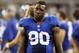 Sep 8, 2013; Arlington, TX, USA; New York Giants defensive end Jason Pierre-Paul (90) on the sidelines during the fourth quarter of the game against the Dallas Cowboys at AT&T Stadium. The Dallas Cowboys beat the New York Giants 36-31. Mandatory Credit: Tim Heitman-USA TODAY Sports