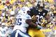 Sep 8, 2013; Pittsburgh, PA, USA; Tennessee Titans outside linebacker Zach Brown (55) keeps Pittsburgh Steelers running back Isaac Redman (33) from scoring into the end-zone during the fourth quarter at Heinz Field. The Tennessee Titans won 16-9. Mandatory Credit: Charles LeClaire-USA TODAY Sports