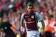 BIRMINGHAM, ENGLAND - AUGUST 24: Antonio Luna (R) of Aston Villa is tracked by Jordan Henderson (L) of Liverpool during the Barclays Premier League match between Aston Villa and Liverpool at Villa Park on August 24, 2013 in Birmingham, England. (Photo by Michael Steele/Getty Images)