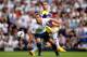 LONDON, ENGLAND - AUGUST 25: Roberto Soldado of Spurs attempts to control the ball under pressure from Chico of Swansea during the Barclays Premier League match between Tottenham Hotspur and Swansea City at White Hart Lane on August 25, 2013 in London, England. (Photo by Michael Regan/Getty Images)