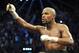 May 4, 2013; Las Vegas, NV, USA; Floyd Mayweather holds his championship belt after his WBC Welterweight title fight defeating Robert Guerrero at the MGM Grand Garden Arena. Mandatory Credit: Jayne Kamin-Oncea-USA TODAY Sports