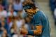 NEW YORK, NY - SEPTEMBER 09: Rafael Nadal of Spain reacts during his men's singles final match against Novak Djokovic of Serbia on Day Fifteen of the 2013 US Open at the USTA Billie Jean King National Tennis Center on September 9, 2013 in the Flushing neighborhood of the Queens borough of New York City. (Photo by Mike Stobe/Getty Images for the USTA)