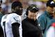 Sep 9, 2013; Landover, MD, USA; Philadelphia Eagles head coach Chip Kelly talks with quarterback Michael Vick (7) during the first half against the Washington Redskins at FedEX Field. Mandatory Credit: Brad Mills-USA TODAY Sports