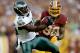 LANDOVER, MD - SEPTEMBER 09: Running back LeSean McCoy #25 of the Philadelphia Eagles runs the ball in front of outside linebacker Brian Orakpo #98 of the Washington Redskins in the first quarter at FedExField on September 9, 2013 in Landover, Maryland. (Photo by Patrick Smith/Getty Images)