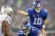ARLINGTON, TX - SEPTEMBER 08: Quarterback Eli Manning #10 of the New York Giants calls out from under center in the first quarter against the Dallas Cowboys in the first half on September 8, 2013 at AT&T Stadium in Arlington, Texas. (Photo by Ronald Martinez/Getty Images)