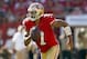 Sep 8, 2013; San Francisco, CA, USA; San Francisco 49ers quarterback Colin Kaepernick (7) runs with the ball against the Green Bay Packers in the fourth quarter at Candlestick Park. The 49ers defeated the Packers 34-28. Mandatory Credit: Cary Edmondson-USA TODAY Sports