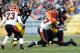 PITTSBURGH, PA - DECEMBER 23: Ben Roethlisberger #7 of the Pittsburgh Steelers is tackled after running wight the ball by Geno Atkins #97 of the Cincinnati Bengals during the game at Heinz Field on December 23, 2012 in Pittsburgh, Pennsylvania. (Photo by Jared Wickerham/Getty Images)