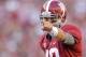 November 10, 2012; Tuscaloosa, AL, USA; Alabama Crimson Tide quarterback A.J. McCarron (10) points out the Texas A&M Aggies defense during second quarter of their football game at Bryant Denny Stadium. Mandatory Credit: John David Mercer-USA TODAY Sports