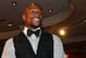 LAS VEGAS, NV - AUGUST 10: Boxer Floyd Mayweather Jr. watches a video as he accepts the award for Male Fighter of the Year from Nevada at the Nevada Boxing Hall of Fame inaugural induction gala at the Monte Carlo Resort and Casino on August 10, 2013 in Las Vegas, Nevada. (Photo by Ethan Miller/Getty Images)