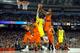 Mitch McGary (No. 4) was key to Michigan's improved defense during the NCAA tournament last season.