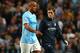 Vincent Kompany trudges off injured during City's 4-0 win over Newcastle United.