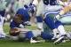 Sep 8, 2013; Arlington, TX, USA; New York Giants running back David Wilson (22) fumbles the ball in the third quarter against Dallas Cowboys defensive tackle Nick Hayden (96) at AT&T Stadium. Mandatory Credit: Matthew Emmons-USA TODAY Sports