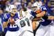 Nov 4, 2012; Indianapolis, IN, USA; Indianapolis Colts quarterback Andrew Luck (12) drops back to pass as tackle Bradley Sowell (60) blocks Miami Dolphins defensive end Cameron Wake (91) during the game at Lucas Oil Stadium. Mandatory Credit: Thomas J. Russo-USA TODAY Sports