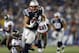 Aug 16, 2013; Foxborough, MA, USA; New England Patriots tight end Zach Sudfeld (44) is tackled by Tampa Bay Buccaneers safety Keith Tandy (37) during the second quarter at Gillette Stadium. Mandatory Credit: Greg M. Cooper-USA TODAY Sports