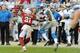 Calvin Johnson (right) of the Lions looks for extra yardage against Patrick Peterson.