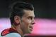 CARDIFF, WALES - SEPTEMBER 10: Wales player Gareth Bale looks on during the FIFA 2014 World Cup Qualifier Group A match between Wales and Serbia at Cardiff City Stadium on September 10, 2013 in Cardiff, Wales. (Photo by Stu Forster/Getty Images)