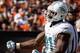 CLEVELAND, OH - SEPTEMBER 08: Defensive end Cameron Wake #91 of the Miami Dolphins celebrates after sacking quarterback Brandon Weeden #3 of the Cleveland Browns at Cleveland Browns Stadium on September 8, 2013 in Cleveland, Ohio. (Photo by Matt Sullivan/Getty Images)