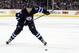 Mar 14, 2013; Winnipeg, Manitoba, CAN; Winnipeg Jets defenseman Ron Hainsey (6) gets ready to take a slap shot during the first period against the New York Rangers at the MTS Centre. Mandatory Credit: Bruce Fedyck-USA TODAY Sports