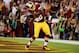Sep 9, 2013; Landover, MD, USA; Washington Redskins running back Alfred Morris (46) celebrates after scoring a touchdown against the Philadelphia Eagles in the third quarter at FedEx Field. The Eagles won 33-27. Mandatory Credit: Geoff Burke-USA TODAY Sports