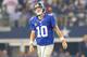 ARLINGTON, TX - SEPTEMBER 08: Quarterback Eli Manning #10 of the New York Giants reacts in the first quarter against the Dallas Cowboys in the first half on September 8, 2013 at AT&T Stadium in Arlington, Texas. (Photo by Ronald Martinez/Getty Images)