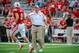 LINCOLN, NE - SEPTEMBER 7: Nebraska Cornhuskers head coach Bo Pelini greets his players before their game against the Southern Miss Golden Eagles at Memorial Stadium on September 7, 2013 in Lincoln, Nebraska. (Photo by Eric Francis/Getty Images)