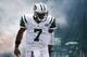 EAST RUTHERFORD, NJ - SEPTEMBER 8: Geno Smith #7 of the New York Jets takes the field against the Tampa Bay Buccaneers during their game at MetLife Stadium on September 8, 2013 in East Rutherford, New Jersey. (Photo by Jeff Zelevansky/Getty Images)
