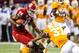 August 31, 2012; Atlanta, GA, USA; North Carolina State Wolfpack wide receiver Quintin Payton (88) is tackled by Tennessee Volunteers defensive back Byron Moore (3) and defensive back Brian Randolph (37) in the first quarter at the Georgia Dome. Mandatory Credit: Daniel Shirey-USA TODAY Sports