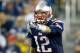 FOXBORO, MA - SEPTEMBER 12: Quarterback Tom Brady #12 of the New England Patriots calls out from under center in the first half while taking on the New York Jets at Gillette Stadium on September 12, 2013 in Foxboro, Massachusetts. (Photo by Jared Wickerham/Getty Images)