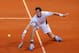 UMAG, CROATIA - SEPTEMBER 13: Andy Murray of Great Britain in action against Borna Coric of Croatia during day one of the Davis Cup World Group play-off tie between Croatia and Great Britain at Stadion Stella Maris on September 13, 2013 in Umag, Croatia. (Photo by Julian Finney/Getty Images)