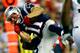 FOXBORO, MA - SEPTEMBER 12: Wide receiver Julian Edelman #11 of the New England Patriots is tackled after a catch in the first quarter against the New York Jets at Gillette Stadium on September 12, 2013 in Foxboro, Massachusetts. (Photo by Jared Wickerham/Getty Images)