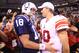 INDIANAPOLIS - SEPTEMBER 19: Eli Manning #10 of the New York Giants and Peyton Manning #18 of the Indianapolis Colts embrace following the Colts 38-14 win at Lucas Oil Stadium on September 19, 2010 in Indianapolis, Indiana. (Photo by Andy Lyons/Getty Images)