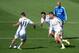 MADRID, SPAIN - SEPTEMBER 13: Real Madrid's new signing Gareth Bale (#11) passes the ball past Cristiano Ronaldo (R) and Pepe (C) while assistant coach Zinedine Zidane looks on during a team training session on September 13, 2013 in Madrid, Spain. (Photo by Denis Doyle/Getty Images)