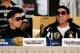 LAS VEGAS, NV - JULY 12: Boxer Danny Garcia's father and trainer Angel Garcia (R) speaks out as Danny Garcia sits during the final news conference at the Mandalay Bay Resort & Casino on July 12, 2012 in Las Vegas, Nevada. Garcia will take on Amir Khah for the WBC super lightweight world championship on July 14 in Las Vegas. (Photo by David Becker/Getty Images)