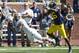 Sep 14, 2013; Ann Arbor, MI, USA; Akron Zips wide receiver L.T. Smith (3) makes a catch over Michigan Wolverines defensive back Jourdan Lewis (26) on the one yard line in the second half at Michigan Stadium. Michigan won 28-24. Mandatory Credit: Rick Osentoski-USA TODAY Sports