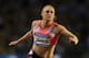 BRUSSELS, BELGIUM - SEPTEMBER 06: Sally Pearson of Australia competes in the Womens 100m Hurdles during the 2013 Belgacom Memorial Van Damme IAAF Diamond League meet at The King Baudouin Stadium on September 6, 2013 in Brussels, Belgium. (Photo by Dean Mouhtaropoulos/Getty Images)