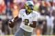 CHARLOTTESVILLE, VA - SEPTEMBER 7: Marcus Mariota #8 of the Oregon Ducks looks to throw a pass against the Virginia Cavaliers during the game at Scott Stadium on September 7, 2013 in Charlottesville, Virginia. (Photo by Joe Robbins/Getty Images)