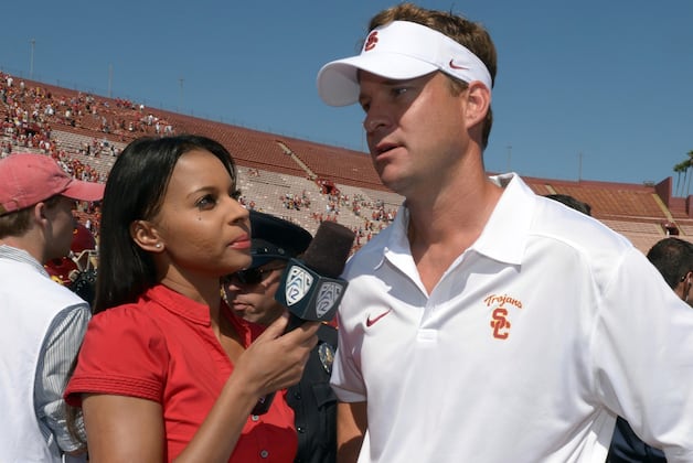 Trojans Replace the Boos with a Little Buzz, but It's a Long Season