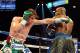 Sep 14, 2013; Las Vegas, NV, USA; Floyd Mayweather Jr. (blue gloves) and Canelo Alvarez battle it during their during their WBC and WBA super welterweight titles fight at MGM Grand Garden Arena. Mandatory Credit: Jayne Kamin-Oncea-USA TODAY Sports