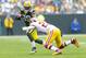 Sep 15, 2013; Green Bay, WI, USA; Green Bay Packers wide receiver James Jones (89) rushes with the football as Washington Redskins cornerback DeAngelo Hall (23) defends during the first quarter at Lambeau Field. Mandatory Credit: Jeff Hanisch-USA TODAY Sports