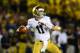 Sep 7, 2013; Ann Arbor, MI, USA; Notre Dame Fighting Irish quarterback Tommy Rees (11) throws a pass during the second quarter against the Michigan Wolverines at Michigan Stadium. Mandatory Credit: Andrew Weber-USA TODAY Sports