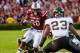 Sep 14, 2013; Columbia, SC, USA; South Carolina Gamecocks running back Mike Davis (28) runs for a gain as Vanderbilt Commodores defensive back Andre Hal (23) closes in in the first quarter at Williams-Brice Stadium. Mandatory Credit: Jeff Blake-USA TODAY Sports
