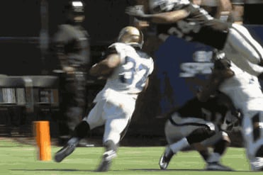 Raiders Safety Charles Woodson Leaps over Blocker for TD-Saving Tackle