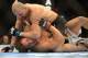 May 26, 2012; Las Vegas, NV, USA; Kyle Kingsbury (top) fights with Glover Teixeira (bottom) during UFC 146 at the MGM Grand Garden event center. Mandatory Credit: Ron Chenoy-USA TODAY Sports